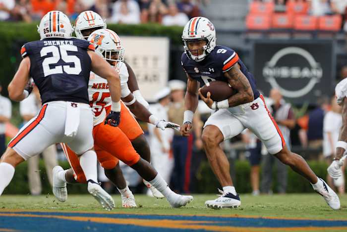 Sep 3, 2022; Auburn, Alabama, USA; Auburn Tigers quarterback Robby Ashford (9) carries against the Mercer Bears during the first quarter at Jordan-Hare Stadium. Mandatory Credit: John Reed-USA TODAY Sports